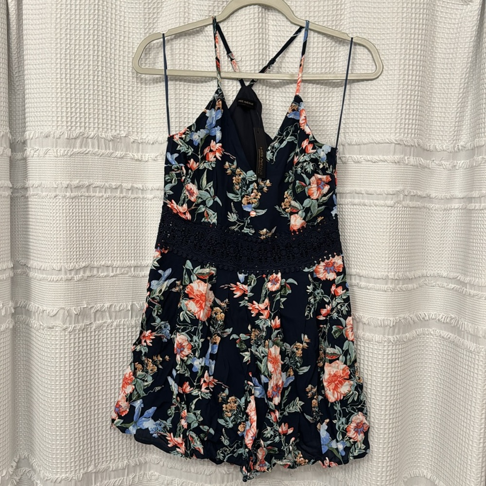 Navy blue flower romper with adjustable straps